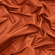 Tissu Tito Taffetas 1401, taffetas de 300 cm aux reflets subtils, coloris brique cuivrée